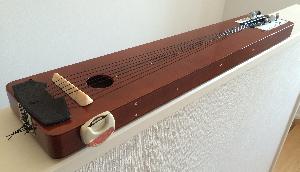 Leftover screw holes from original instrument: 5 on top & 7 on the back